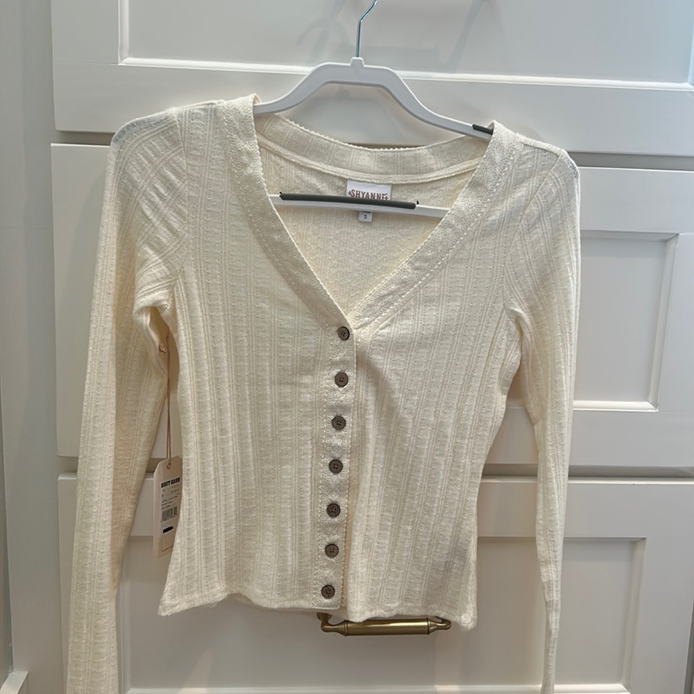 A sweater button up never have worn it got it for a present